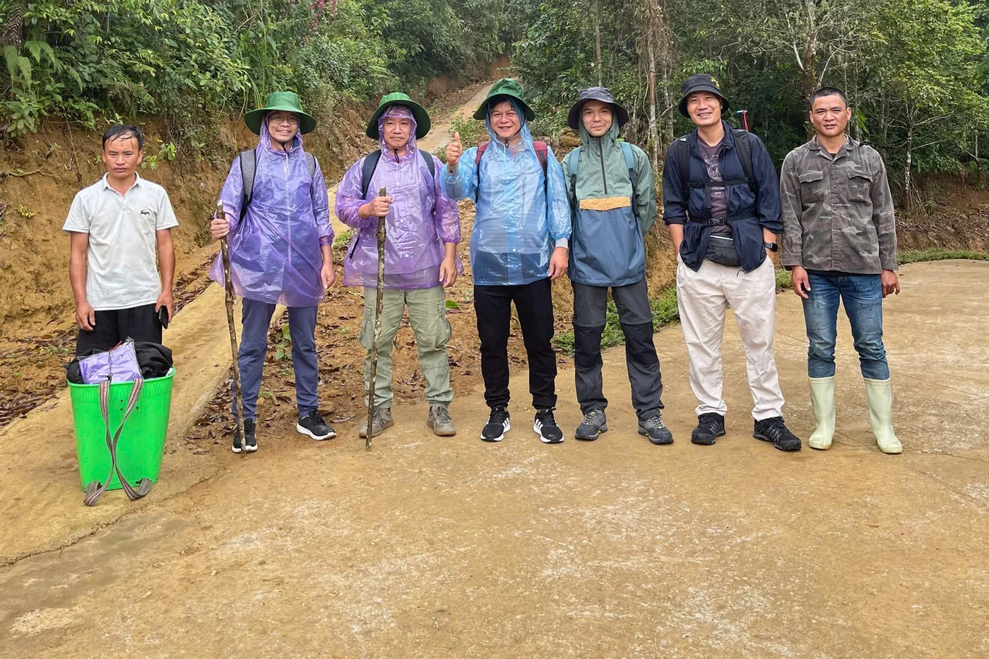 The author's group with their Dao porters at the trailhead before climbing Putaleng