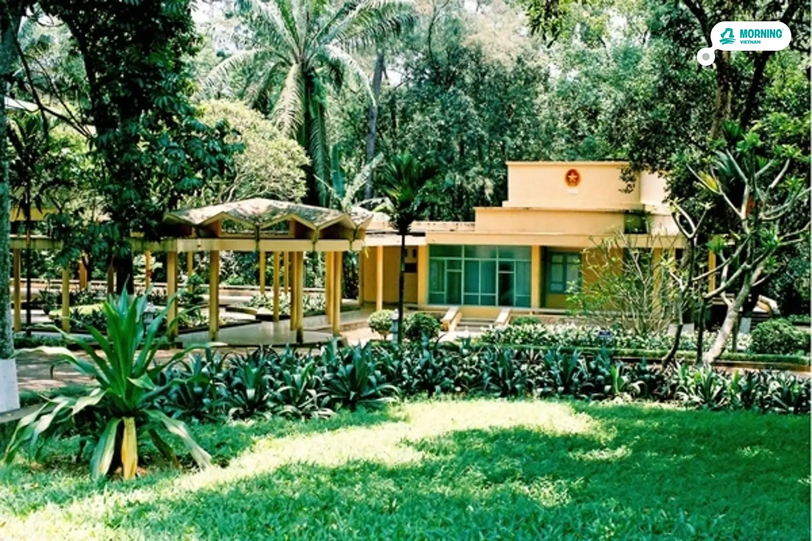 Presidential Palace seen through the tropical garden of the Ba Đình complex